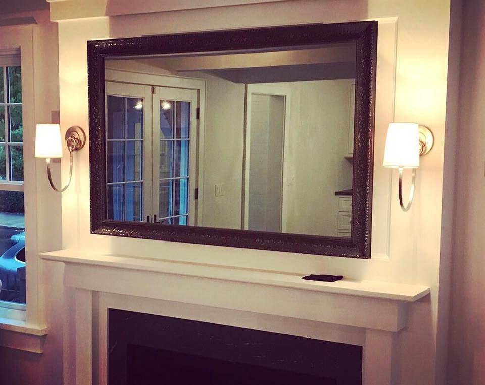 Two way mirror covering tv